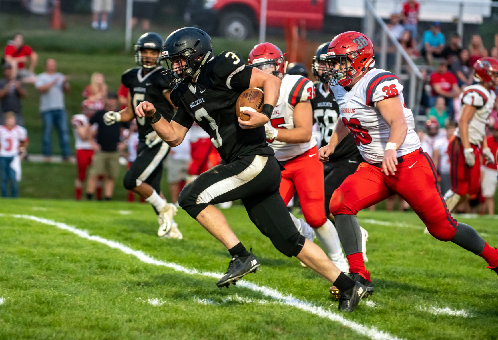 Gazette Photo Gallery: Wildcats outlast Dragons in slugfest